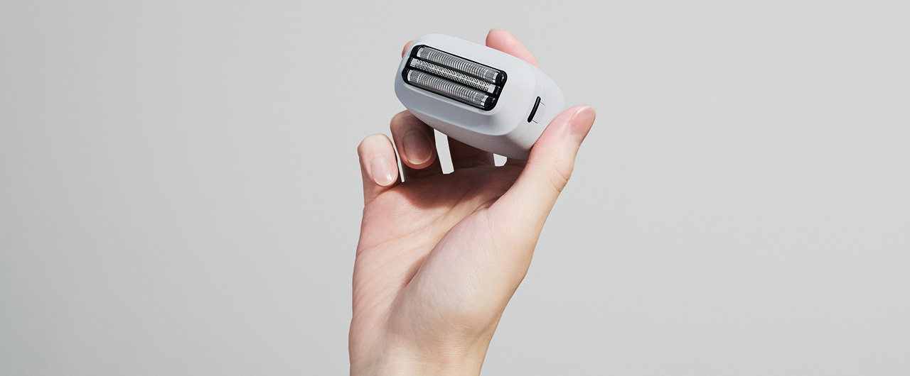 写真:ラムダッシュ パームイン LITE を手に持っている様子